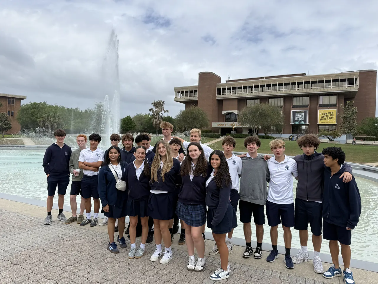 Upper school students on a university campus visit